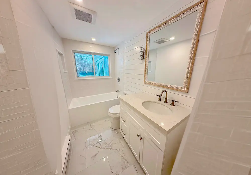 Recent bright bathroom renovation by Leo and Lions Home Group